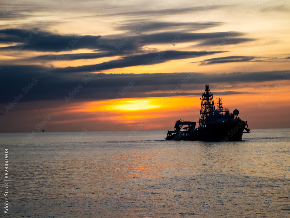 oil tanker in the sunset