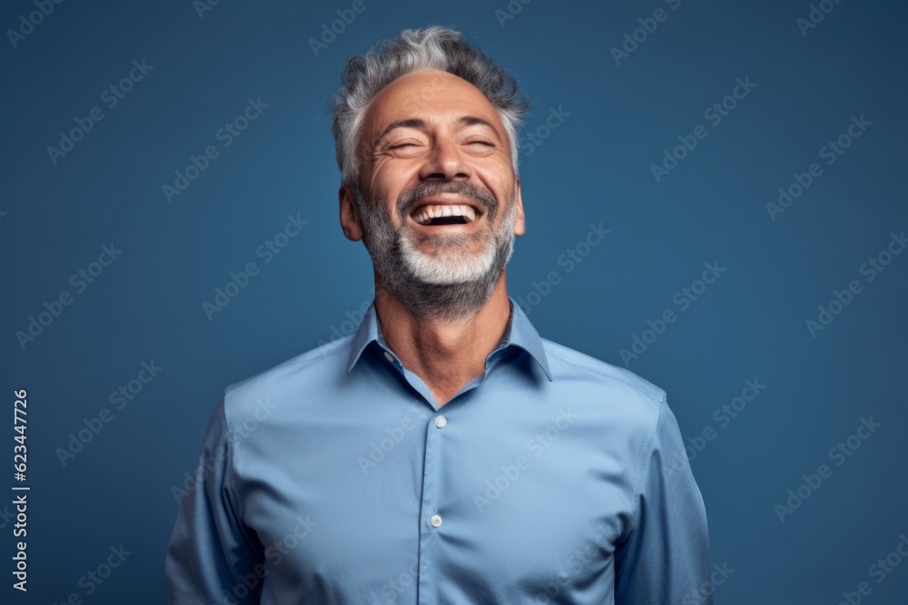 Medium shot portrait photography of a joyful mature man wearing an elegant long-sleeve shirt against a sky-blue background. With generative AI technology
