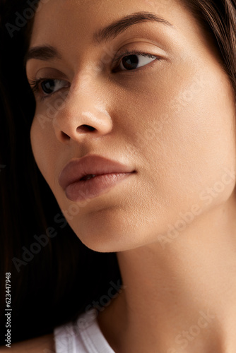 Young woman face beauty closeup