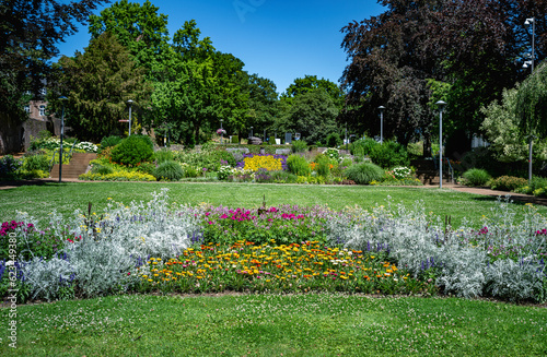various colors of flowers and plants in a large park in germany in wassenberg photo