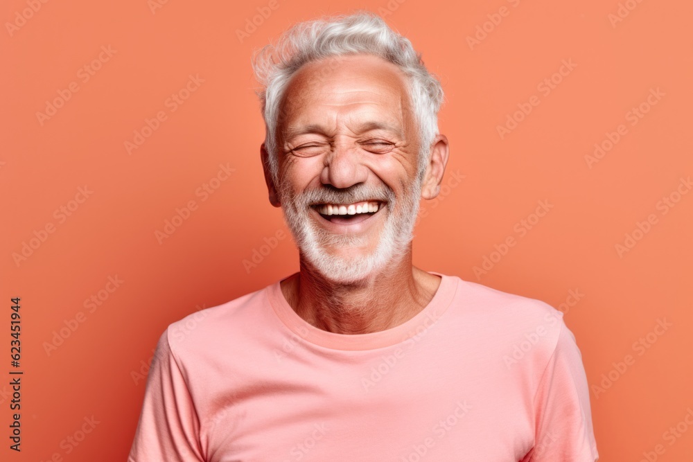 Close-up portrait photography of a joyful old man wearing a casual t-shirt against a coral pink background. With generative AI technology Close-up portrait photography of a joyful old man wearing a casual t-shirt against a coral pink background. With generative AI technology