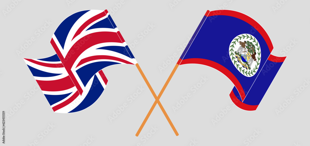 Crossed and waving flags of United Kingdom and Belize Crossed and waving flags of United Kingdom and Belize