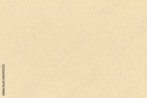 It is a background material of a light yellow craft paper. 