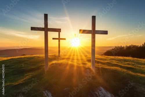 Wooden cross on top of a hill, beautiful sunset