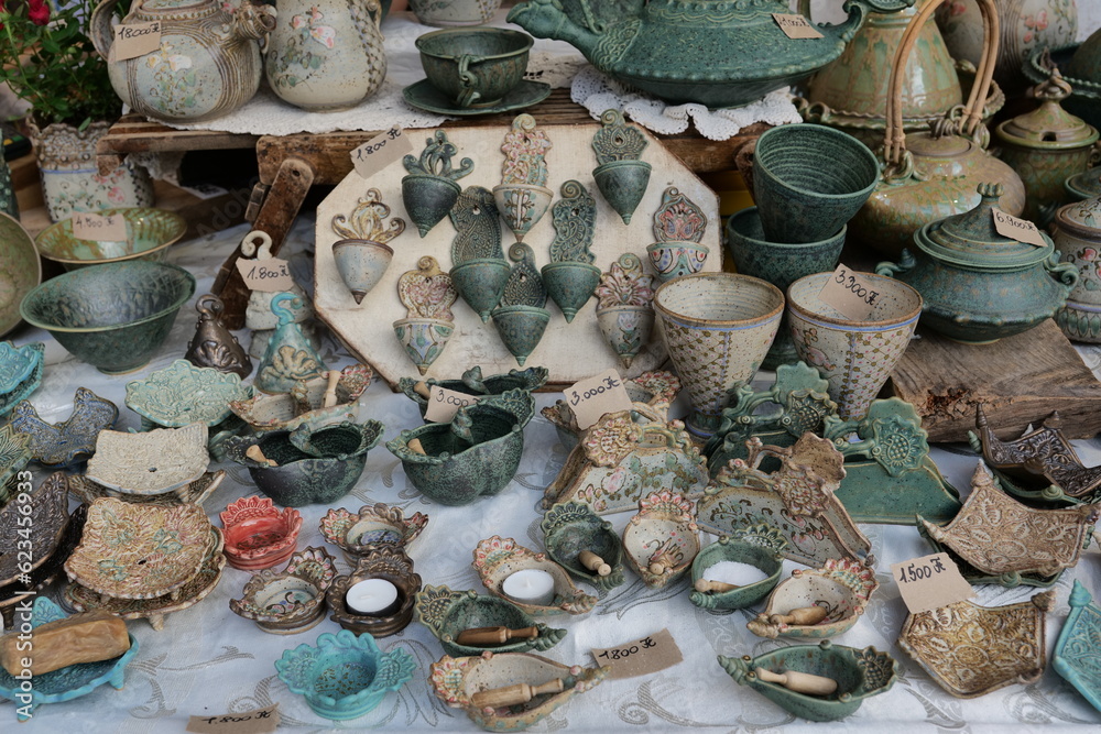 Beautiful colorful traditional ceramic crafted decoration items in the handicraft market.