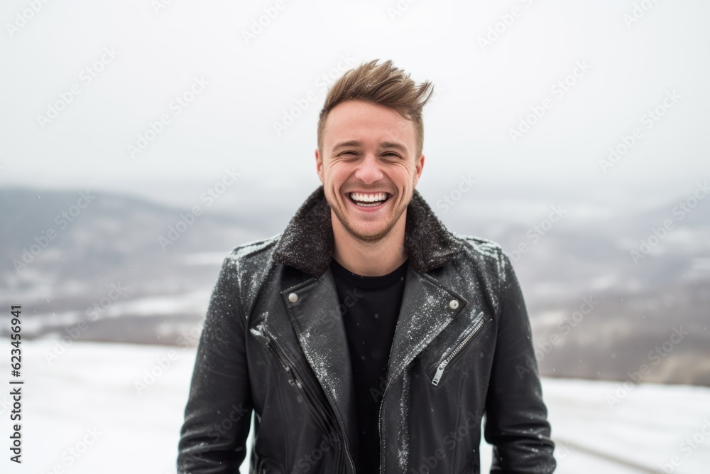 Medium shot portrait photography of a grinning boy in his 30s wearing a trendy leather jacket against a snowy landscape background. With generative AI technology Medium shot portrait photography of a grinning boy in his 30s wearing a trendy leather jacket against a snowy landscape background. With generative AI technology