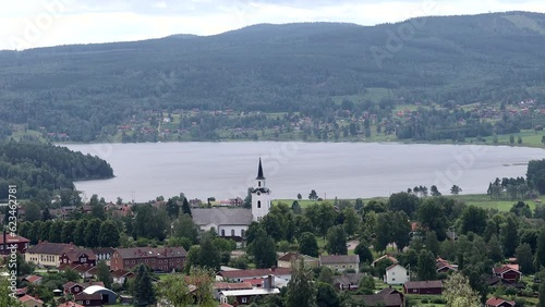 Silansnas, Lake Sijan, Sweden A summer landscape view over Lake Siljan and the town of Siljansnas and the church.  photo