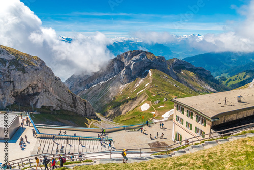 Beautiful view of the panorama terrace and the Hotel Pilatus Kulm with the Matthorn summit in the background. The Pilatus is a massif made up of multiple peaks.