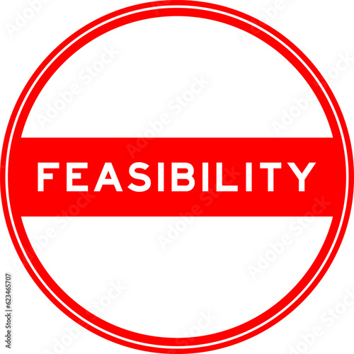 Black color round seal sticker in word feasibility on white background
