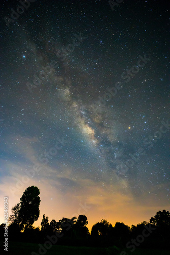 Night sky atmosphere, Milky Way, and stars on dark background with grain and Noise.