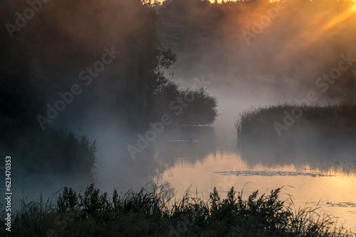 Sunrise in the morning fog in Ukraine © Mendi Thaler
