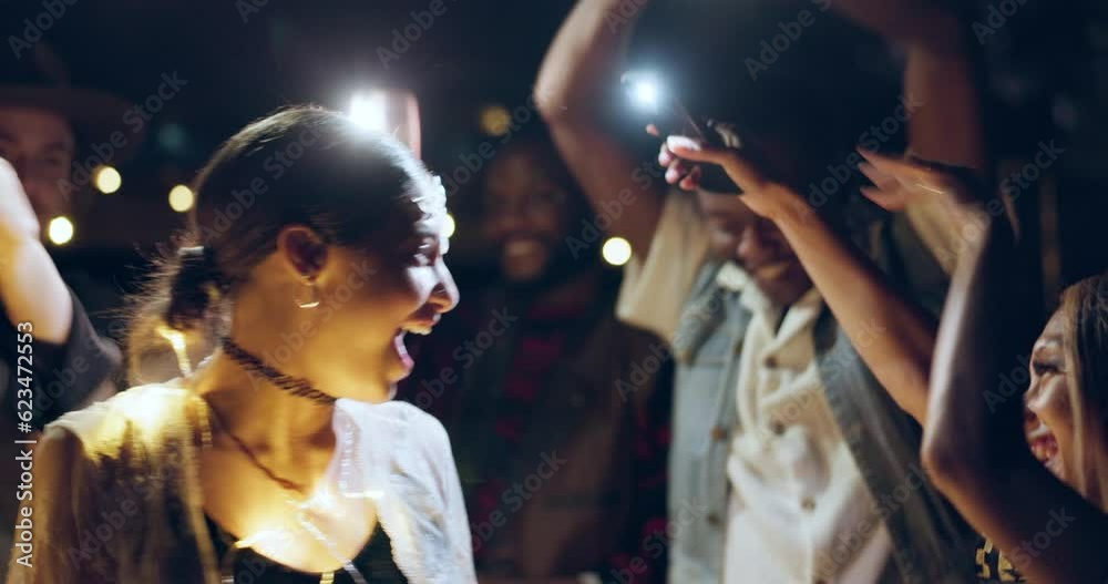 Festival, woman and outdoor at night with dance with group at party and event in the dark. Freedom, social and female person at concert with dj and music in crowd with movement and friends with song