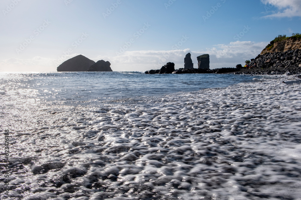 Foamy water on the  Beautiful landscape of Mosteiros Beach, Black Sand Beach, São Miguel Island, Azores, Portugal