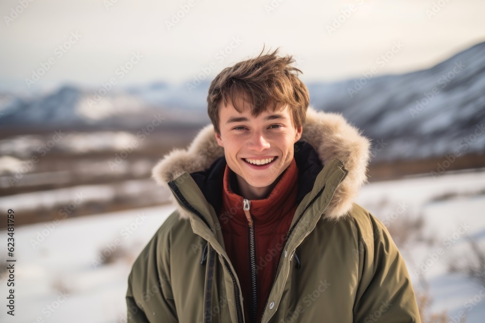 Studio portrait photography of a grinning boy in his 30s wearing a cozy winter coat against a national park background. With generative AI technology Studio portrait photography of a grinning boy in his 30s wearing a cozy winter coat against a national park background. With generative AI technology