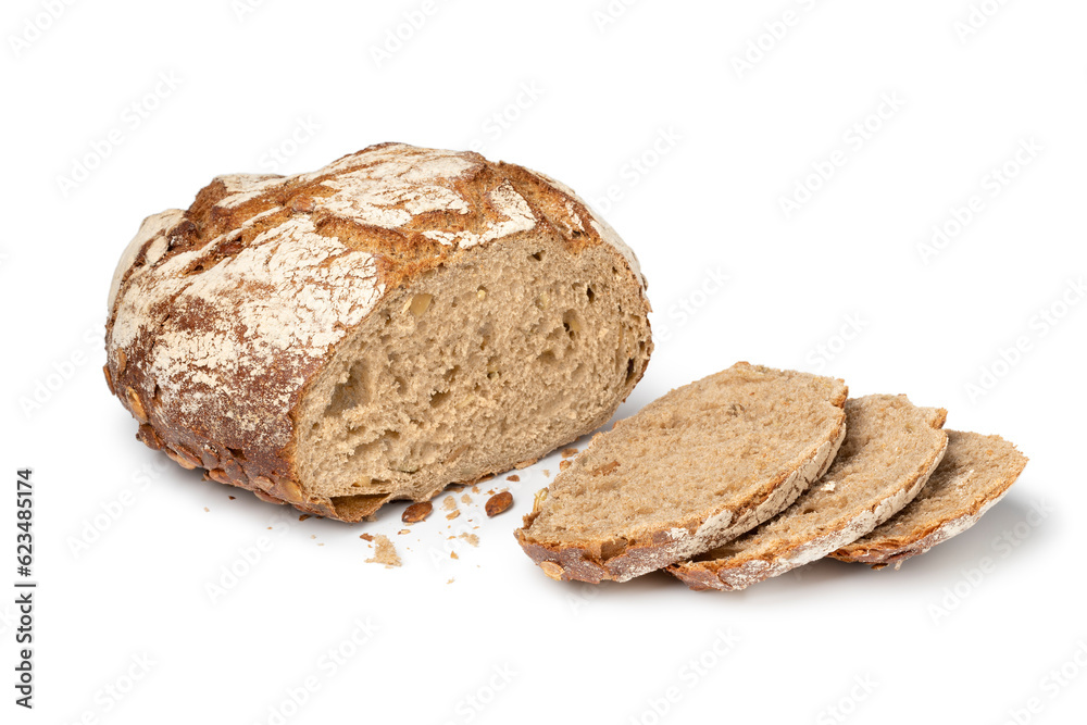 Sourdough loaf of bread with pumpkin seeds and slices close up isolated on white background Sourdough loaf of bread with pumpkin seeds and slices close up isolated on white background