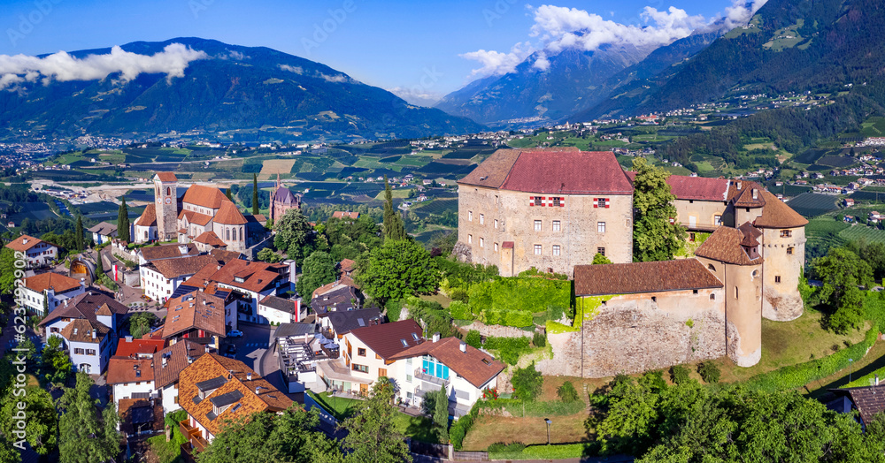 Tourism of northern Italy.  Traditional picturesque mountain village Schenna (Scena) near Merano town in Trentino - Alto Adige region. view of medieval castle, aerial view