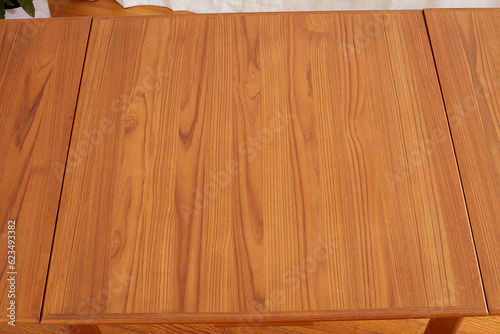 Teak wood grain texture. The pattern on a vintage wooden table top. 