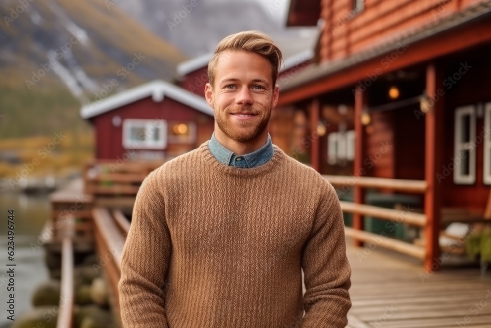 Medium shot portrait photography of a satisfied boy in his 30s wearing a cozy sweater against a cozy mountain lodge background. With generative AI technology Medium shot portrait photography of a satisfied boy in his 30s wearing a cozy sweater against a cozy mountain lodge background. With generative AI technology