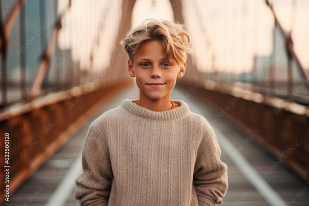 Medium shot portrait photography of a glad kid male wearing a cozy sweater against a picturesque bridge background. With generative AI technology Medium shot portrait photography of a glad kid male wearing a cozy sweater against a picturesque bridge background. With generative AI technology
