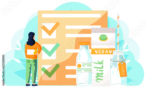 A girl stands and examines marked checklist on background. Plastic bottle with label and carton with vegan plant-based milk. Veganism and vegetarianism concept. A woman adheres to healthy lifestyle