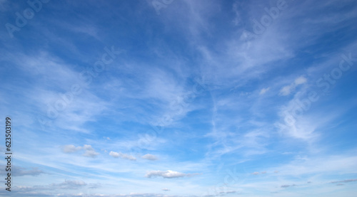 White fluffy clouds in the sky.