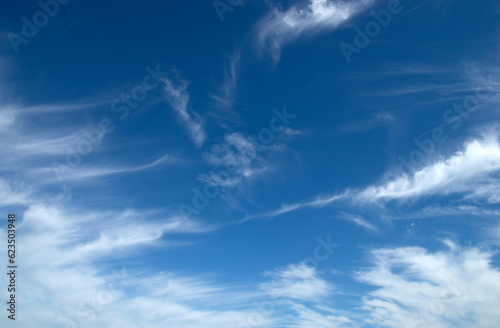 White fluffy clouds in the sky.