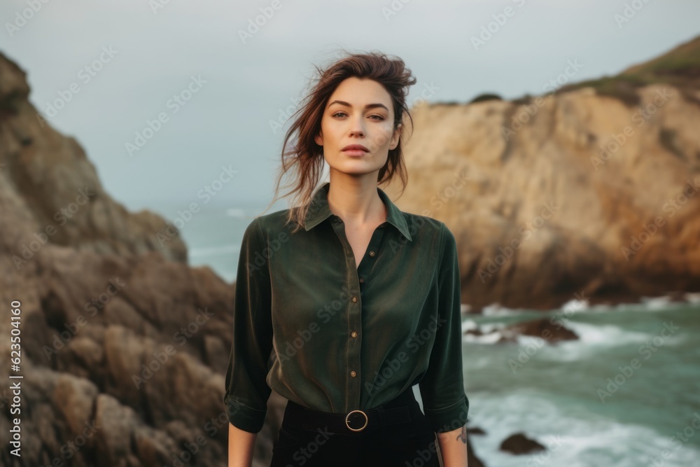 Eclectic portrait photography of a glad girl in her 30s wearing an elegant long-sleeve shirt against a scenic ocean cliff background. With generative AI technology Eclectic portrait photography of a glad girl in her 30s wearing an elegant long-sleeve shirt against a scenic ocean cliff background. With generative AI technology