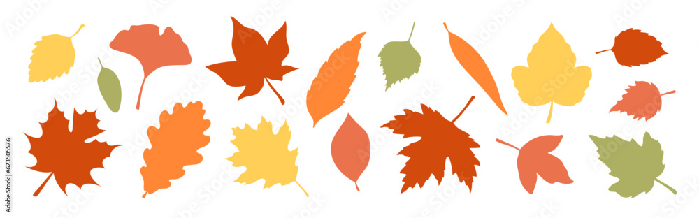 A set of silhouettes of autumn leaves in warm colors