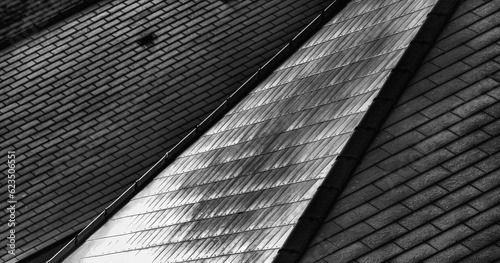 Abstracty view of an idustrial roof with slate tiles photo