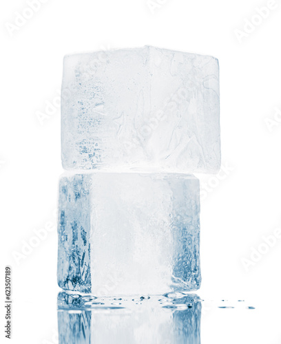 Ice blocks in a cube form, stacked on a mirror surface, isolated on white background.