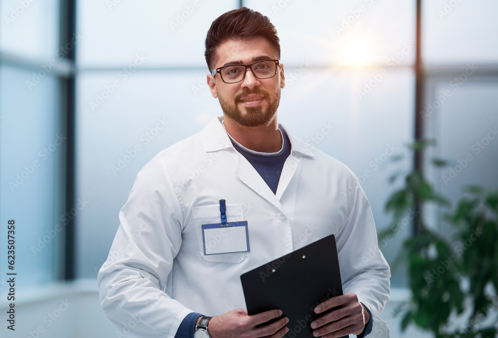 experienced doctor with a folder in his hands l