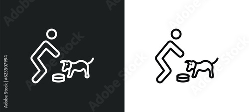 feeding a dog icon isolated in white and black colors. feeding a dog outline vector icon from people collection for web, mobile apps and ui.