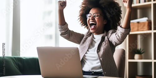 A joyful businesswoman celebrates her success as a freelancer and entrepreneur.