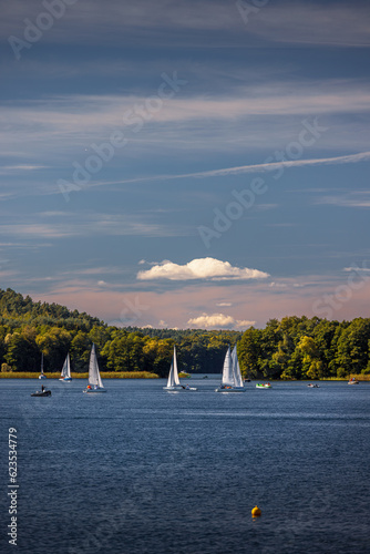 Sailboats on Lake Ukiel in Olsztyn. In the background isthmus 