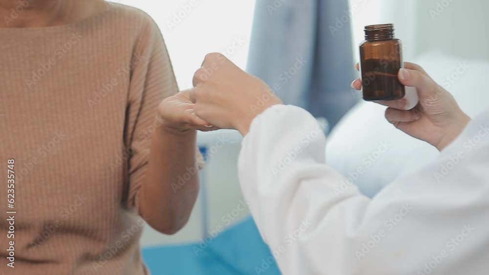 close up doctor, Asian doctor talk with old female patient about disease symptom, doctor use stethoscope listening lung of patient, elderly health check up, happiness hospital close up doctor, Asian doctor talk with old female patient about disease symptom, doctor use stethoscope listening lung of patient, elderly health check up, happiness hospital