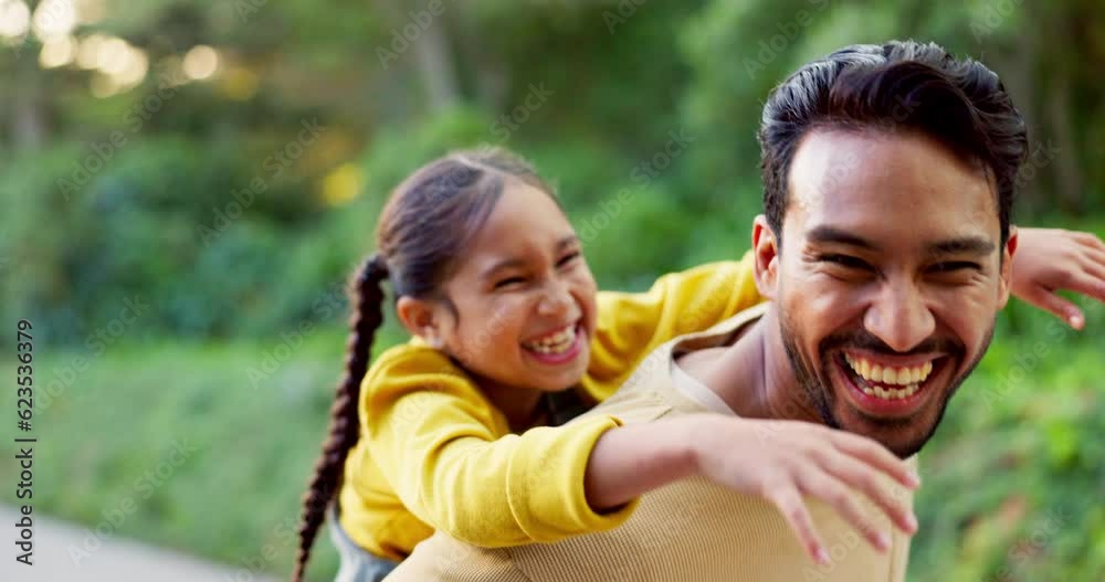 Happy, playful and a father and child in nature for walking, bonding and piggyback. Laughing, family and a young dad with a little girl in a park for weekend fun or activity together with freedom