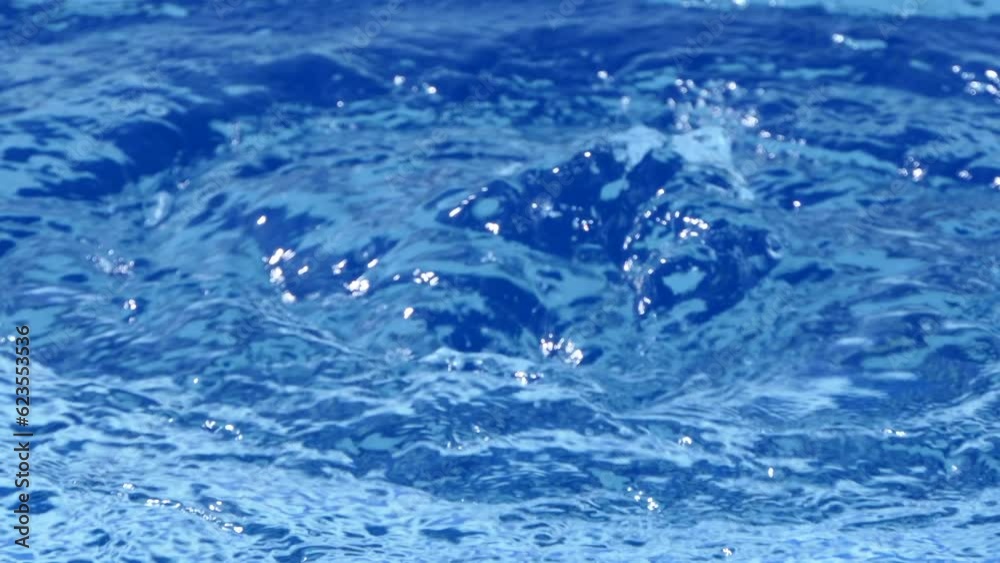 close-up blue water splash background. 4k video capture close-up blue water splash background. 4k video capture