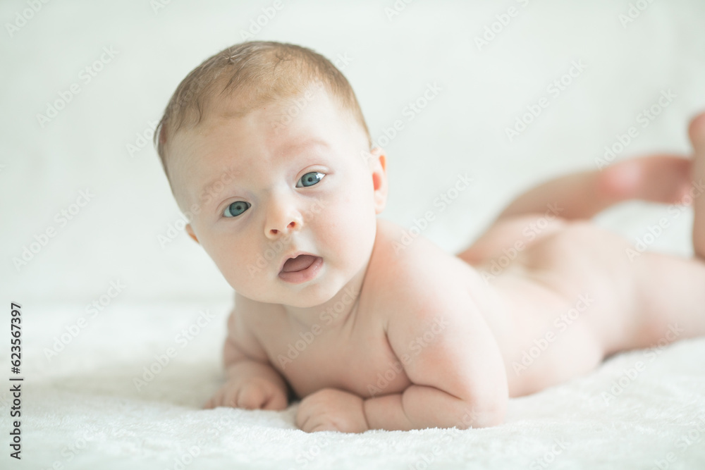 Cute little baby crawling. Family morning at home.  Beautiful smiling son. Beautiful happy child.