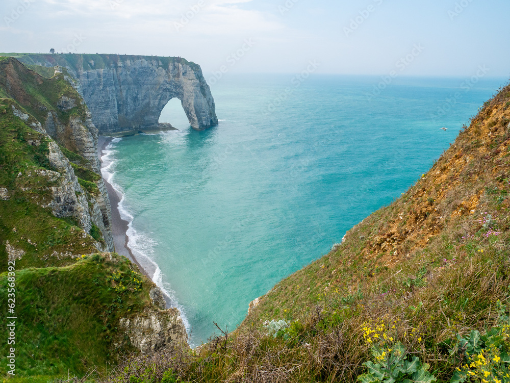 Fototapeta premium An Arch in the white cliffs of Etretat, In Normandy, France.