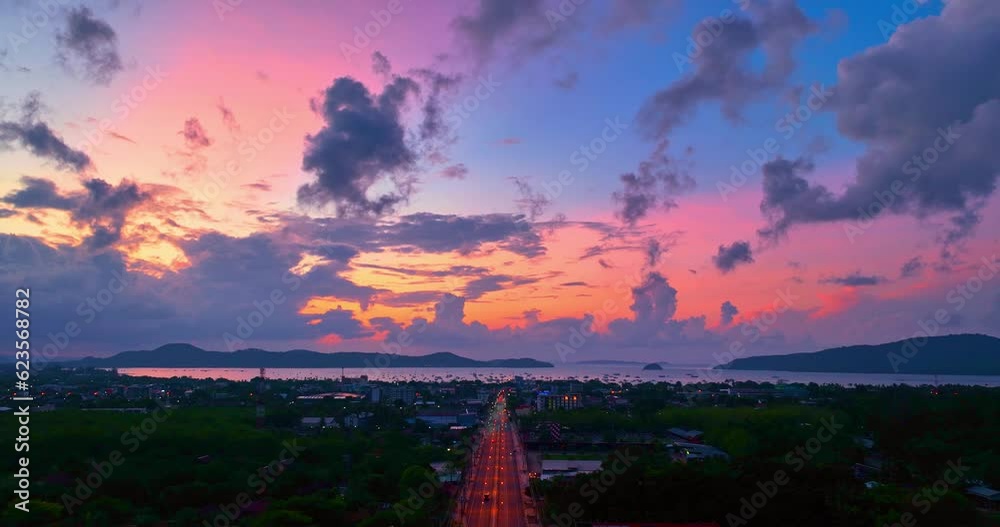 aerial view The bright light illuminated the clouds drifting in the sky. .Magical clouds formed spirals in colorful sunset..colorful clouds spinning around in a mesmerizing dance.