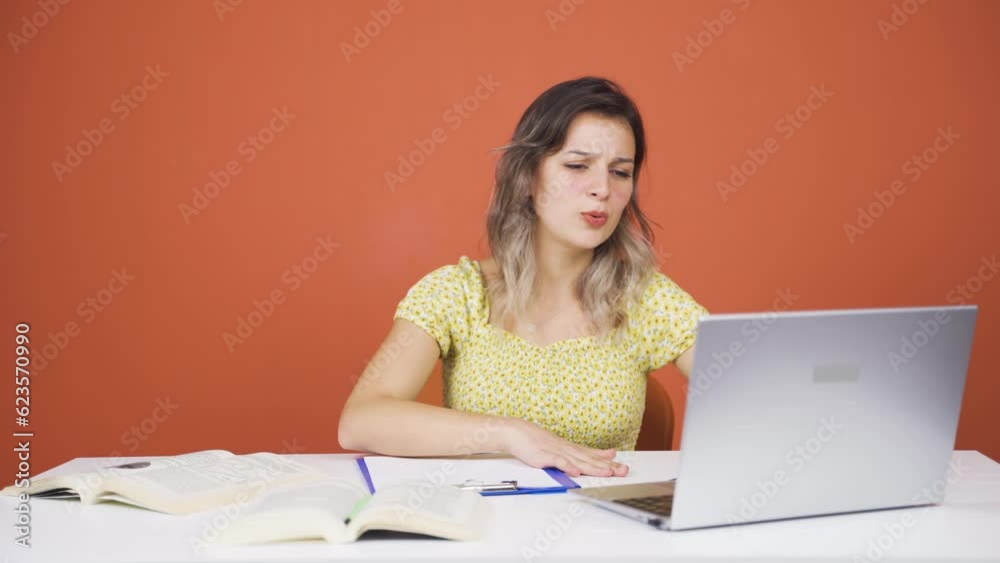 Young woman sending wrong mail on laptop. Can't get mail back. Young woman sending wrong mail on laptop. Can't get mail back.