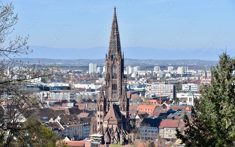 Freiburg, Germany Cityscape with Freiburg Minster Steeple in Center Focus