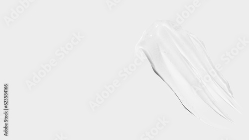 Composition of smears and drops or drops of transparent gel, serum. On a light background.