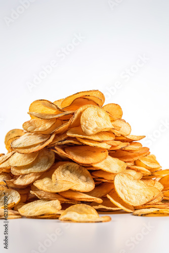 Small stack of delicious crispy potato chips. Potato chips. Stack of crispy potato chips isolated on white background. Realistic 3D illustration. Generative AI