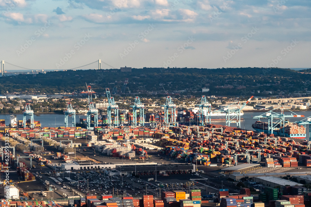 Aerial view of Shipping Containers, Newark Bay, Panamax cranes, and the Port of Newark - Elizabeth Marine Terminal run by the Port Authority of Newark and New Jersey