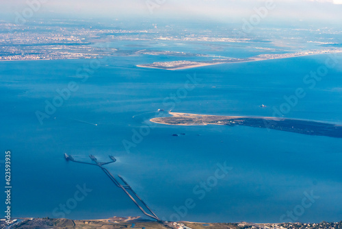 Aerial view of the pier at Naval Weapons Station Earle and Fort Hancock at Sandy Hook Park in the Raritan Bay on the coast of New Jersey in Leonardo, Atlantic Highlands, and Highlands