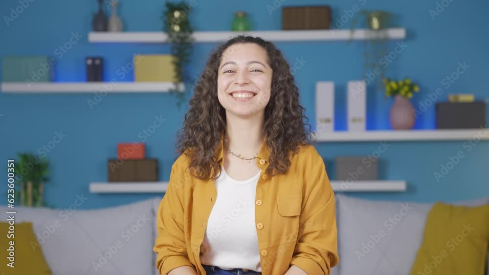 Young woman smiling at camera Young woman smiling at camera