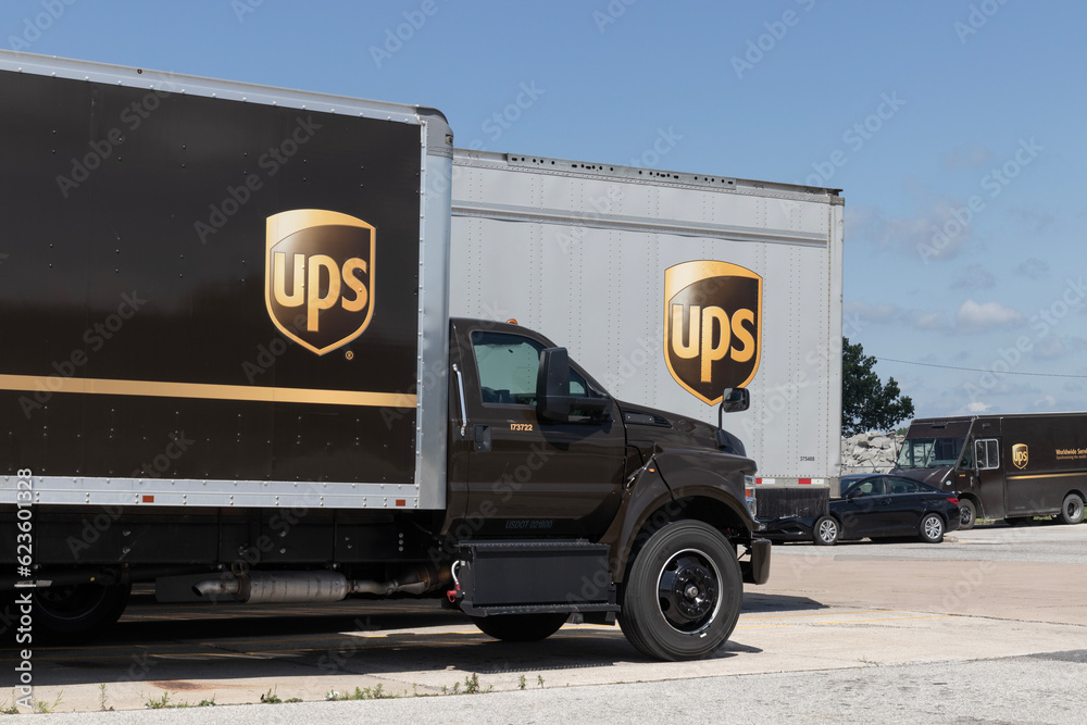 UPS delivery and transport trucks. UPS picks up, transports and