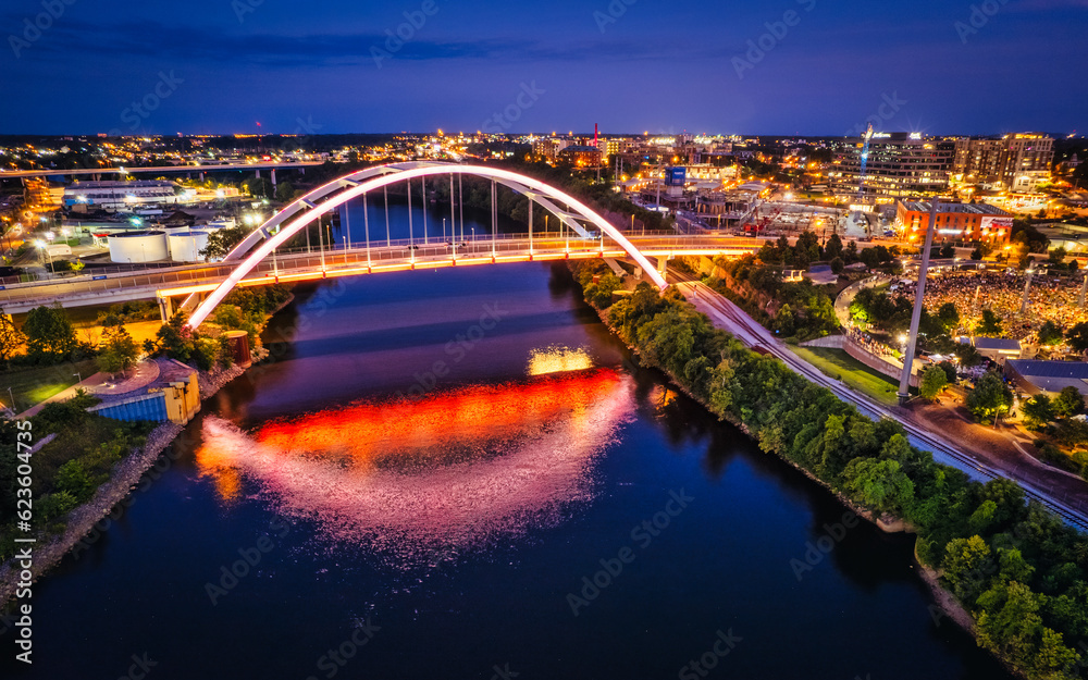 Aerial view of the Korean Veteran War Memorial Bridge crossing the Cumberland River in Nashville at dusk.
