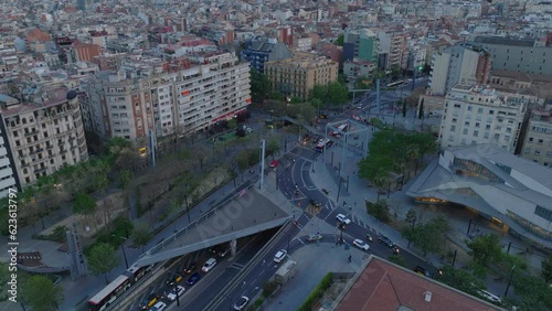 High angle view of vehicles passing through road intersection at Placa de Lesseps. Modern design of transport infrastructure in city. Barcelona, Spain photo